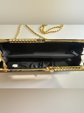 Gold and Black Cylinder Crossbody Clutch with Rhinestones.
